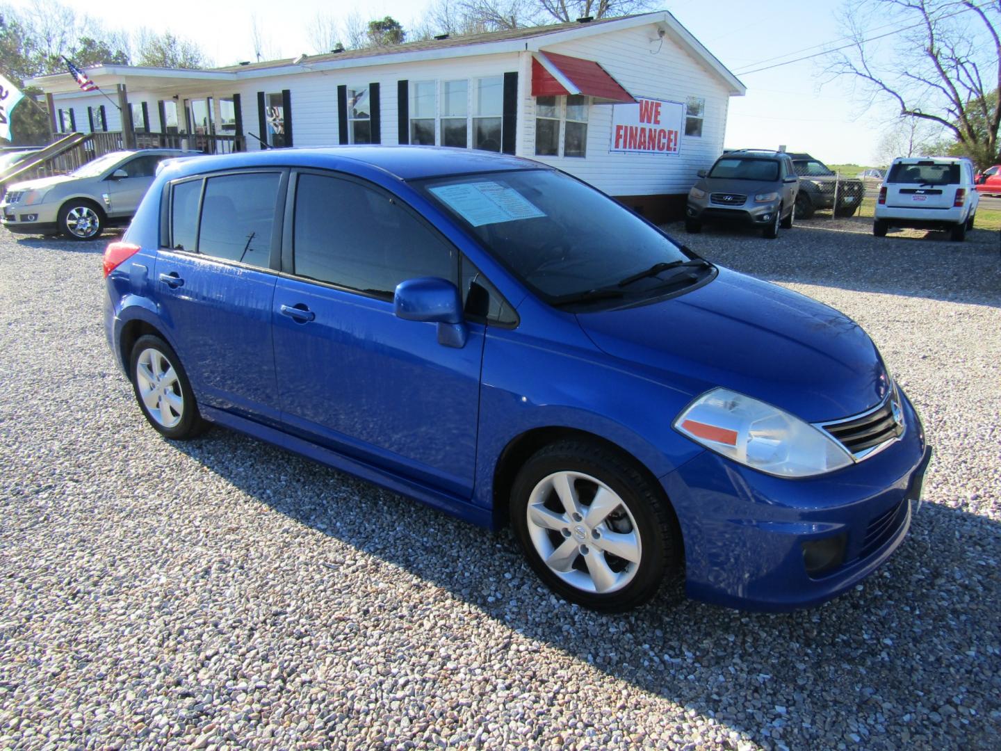 2012 Blue /Black Nissan Versa 1.8 SL Hatchback (3N1BC1CP4CK) with an 1.8L L4 DOHC 16V engine, Automatic transmission, located at 15016 S Hwy 231, Midland City, AL, 36350, (334) 983-3001, 31.306210, -85.495277 - Photo#0